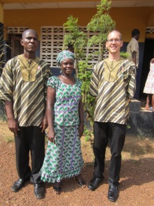 Ben with his host mother and father after service