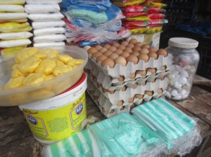 Baking goods - butter, eggs, and baking powder - sold in small quantities.