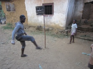 Sock, rocks, string, and stick = Foot Tetherball